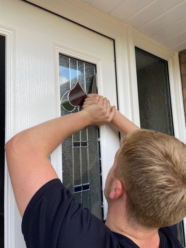 Removing silicon or double sided glazing tape.