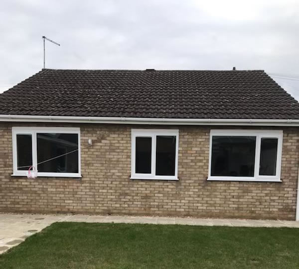 Modern anthracite composite external door installed in Peterborough